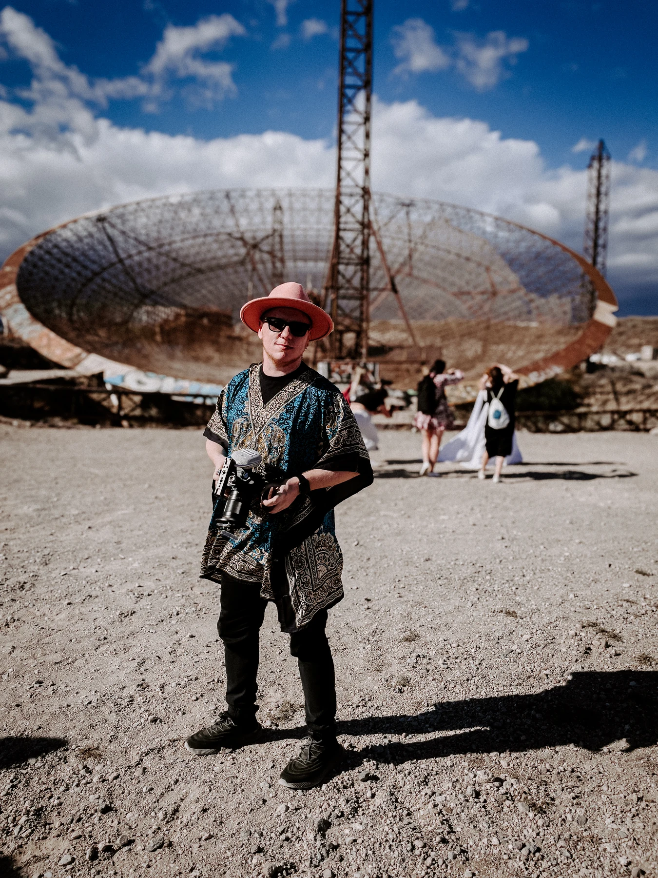 Matej on location in front of a radio telescope